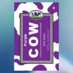 a purple and white cow book cover